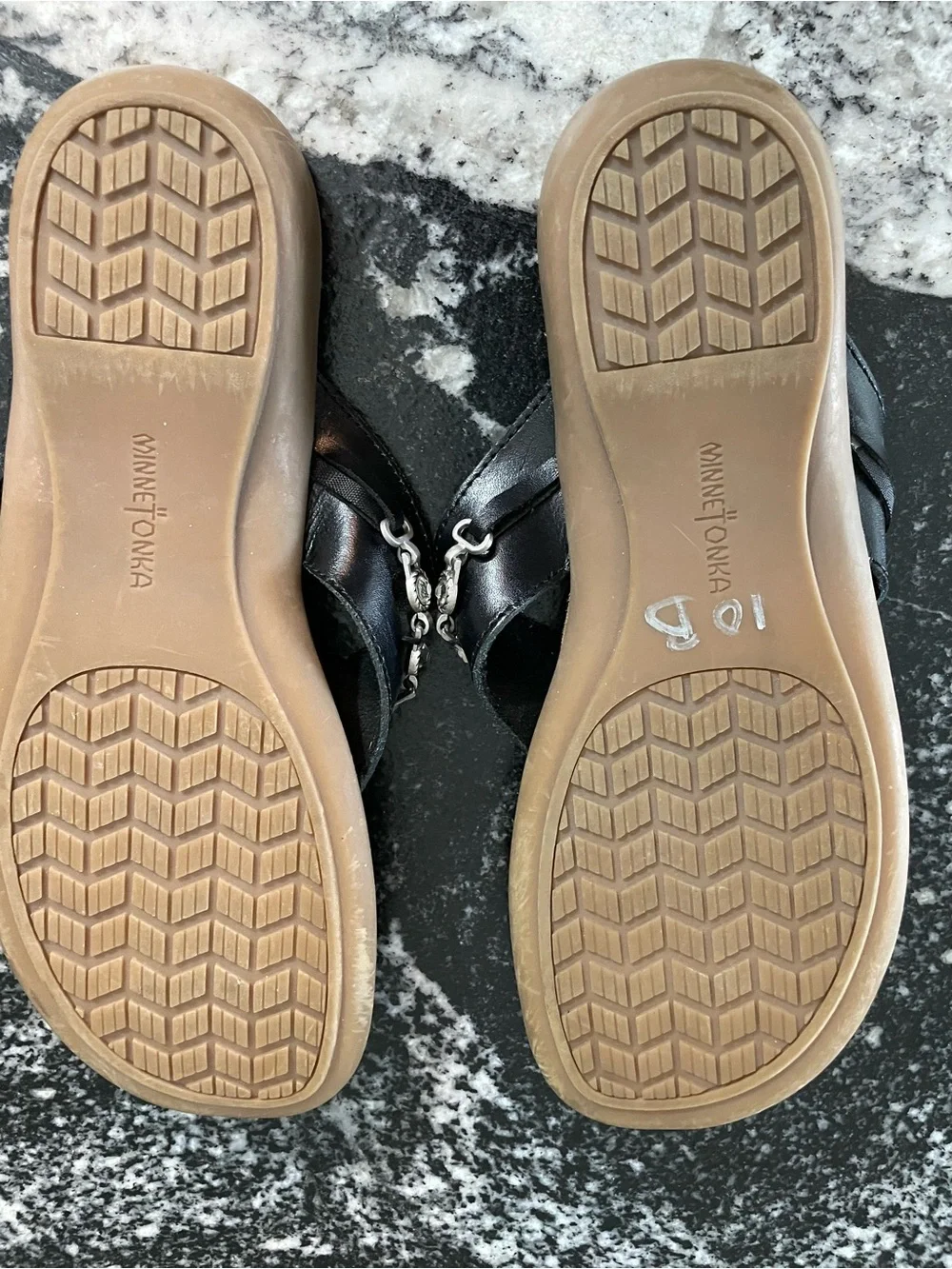 Minnetonka Black Embellished Toe-Post Sandals with Tan Footbed